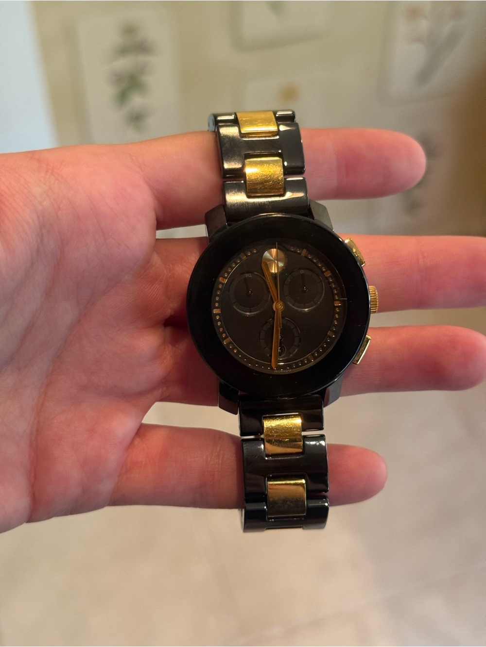 Black and Gold Metal Chronograph Movado Watch